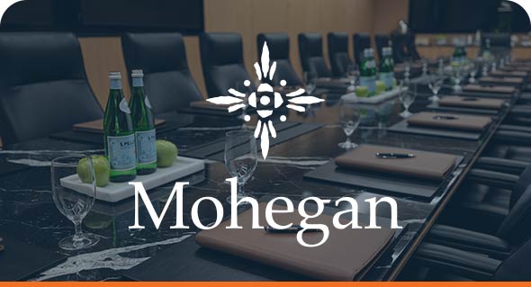 Corporate Boardroom and Mohegan Logo